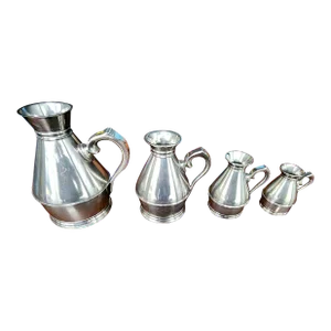 Set of Four Early 20th Century Fine English Polished Pewter Graduated Measuring Jugs