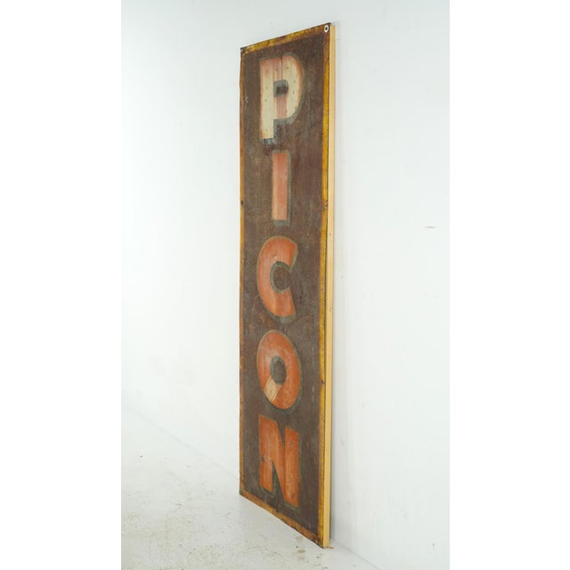 Vintage French steel advertising sign for Picon, a popular orange flavored bitter traditionally added to beer. It's...
