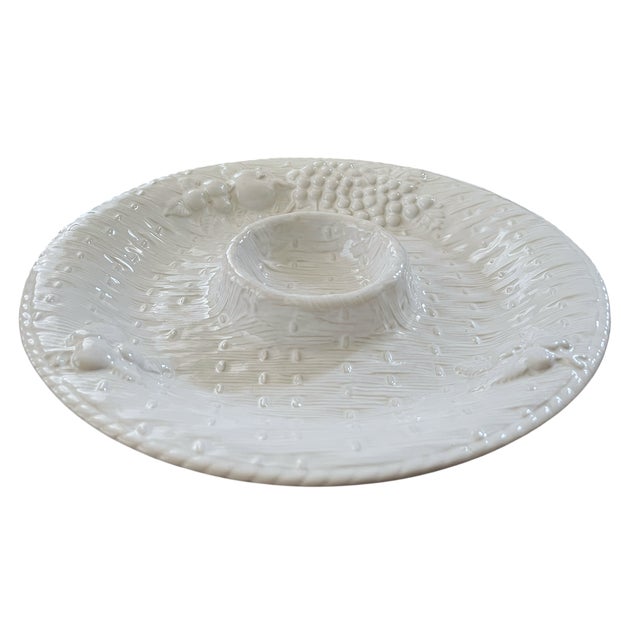 A charming mid-century Portuguese ceramic serving platter by Loucarte, featuring an all-white glazed finish with richly...