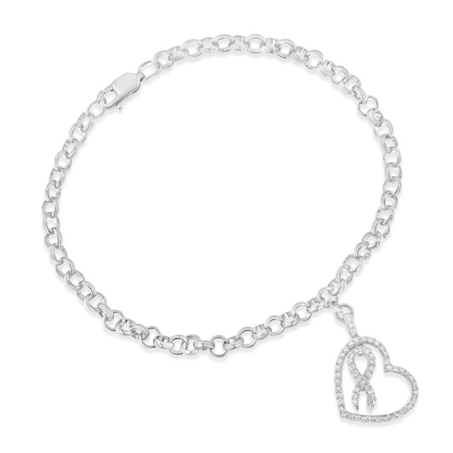 Create your own style icon by wearing this dazzling Heart and Infinity Charm Bracelet. This alluring jewel is crafted of...