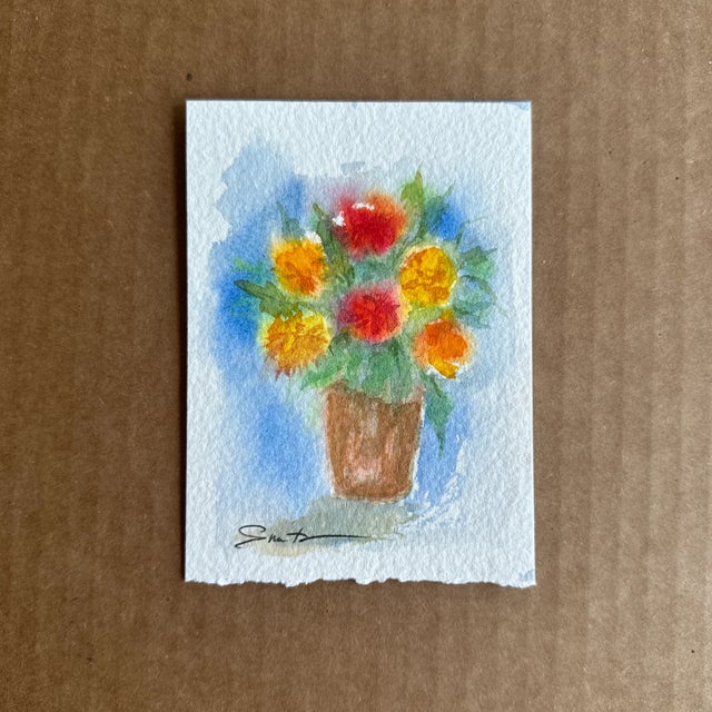 This painting is a bright and cheerful depiction of a flower arrangement. The bouquet consists of warm red, orange, and...