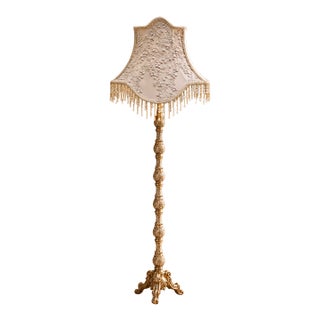 French-Style Gilded Floor Lamp – Ornate Gold Leaf Stand With Embroidered Ivory Shade & Crystal Fringe For Sale