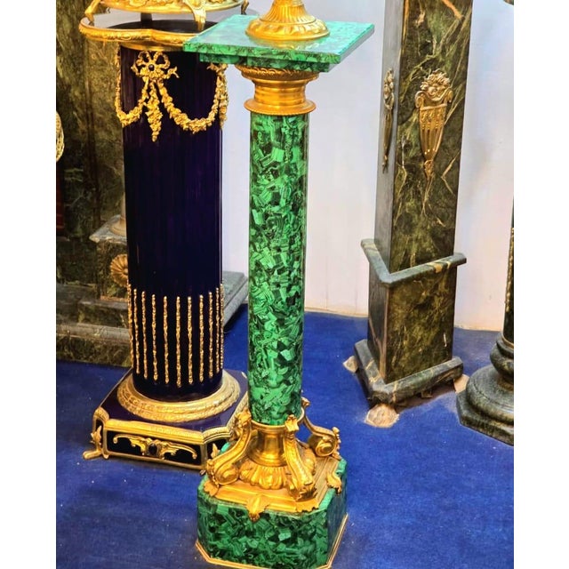 This elegant French Rococo style pedestal features a beautiful marbleized green finish that adds depth and sophistication...