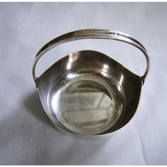 1960's era Mid Century Silverplate Candy Basket designed by Carl Cohr. Measures 5.5" x 5.5" x 5.5" and is in excellent...