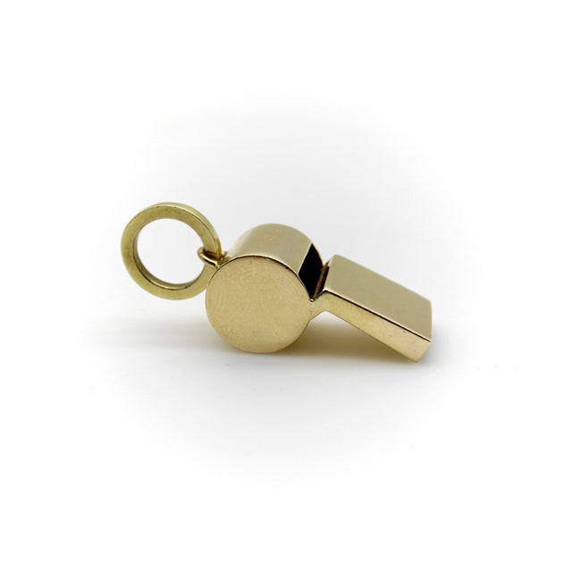 The whistle charms serves as both an iconic piece of jewelry and also a useful call to action. This 18k gold version has a...