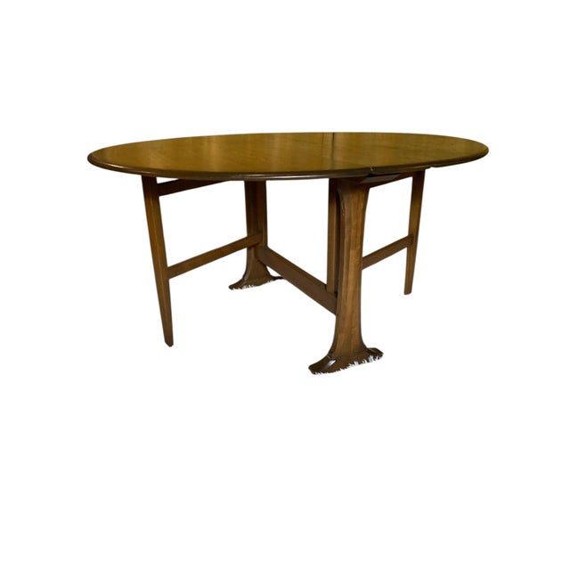 Ercol windsor gateleg dining table&nbsp;or drop-leaf table. This style is a classic mid-century design, typically made...