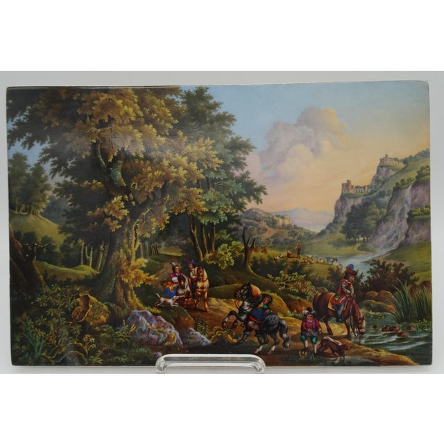 This is a very rare depiction of an animated landscape. Painted by Andre Alfred in 1834. The porcelain plaque has an...