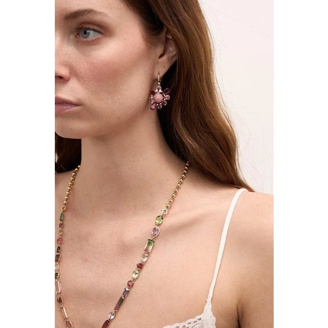 This one of a kind flower drop earrings feature 13.71 cts spinel, 19.39 cts rhodochrosite and .20 cts diamonds. Set in 14k...