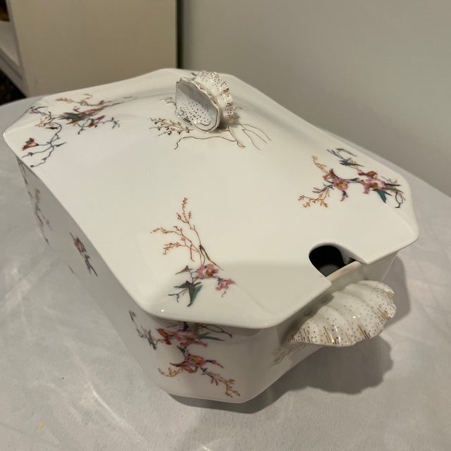 Soup tureen. This is Haviland pattern H1252. It is a beautiful free form floral design in pinks and teals.