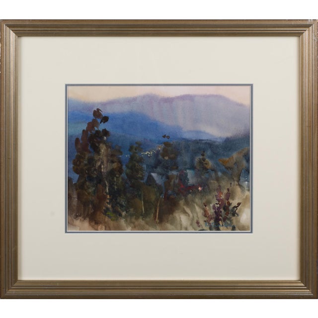 The artwork captures a serene Colorado evening, where soft washes of blue and violet blend seamlessly, evoking a tranquil...