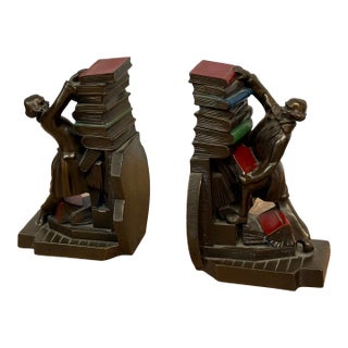 Kronheim & Oldenbusch Metal Novelties Company Struggling Librarian Bronze Bookends, Pair For Sale