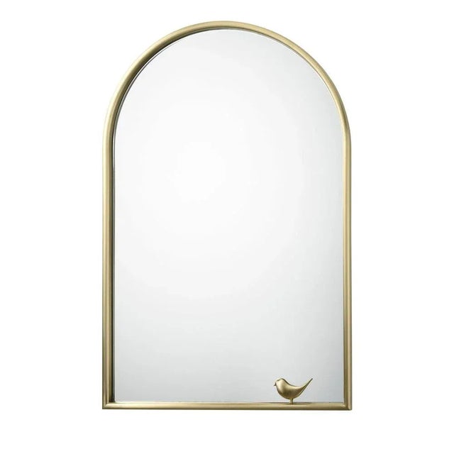 The frame and decoration of this charming mirror was made entirely in brass and creates a timeless piece in which the...