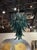 The Murano Deep Green Palm Leaf Chandelier is a stunning ceiling fixture that adds a touch of elegance and sophistication...