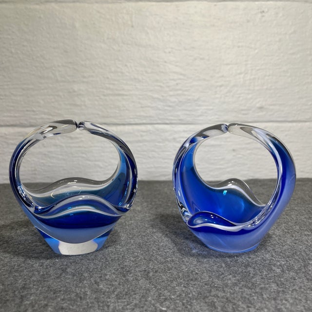 Consists of blue & white glass encased in clear glass, using the Venetian developed sommerso technique. Made by the...