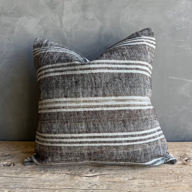 Size: 22" x 22" Colors: Dark Brown / Gray /Oyster Crafted from authentic vintage Turkish hemp rugs, each pillow is a one-...