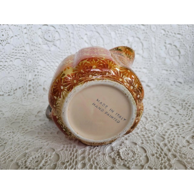 Hand painted in Italy ceramic pitcher, perfect for dining al fresco. With White Lotus vibes all of it, this beauty...