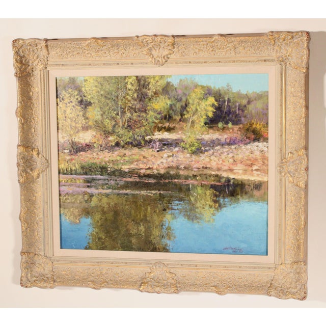 Impressionist landscape painting by William Atkins (1926-1995) titled on verso " Reflections". Oil on board. Frame...