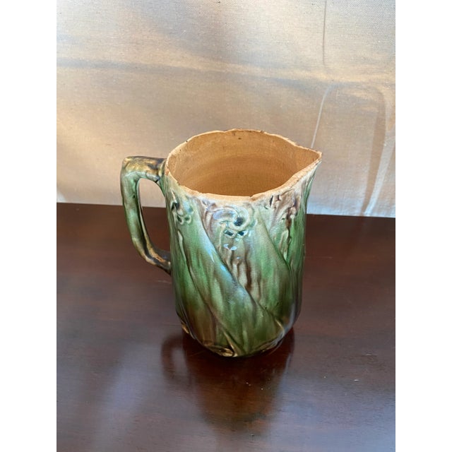 Late 19th Century English-born ceramic pottery Majolica Pitcher derived from an asparagus design and coloration. Based...