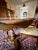 Wood Late 20th Century French Provincial Oak Dining Set — Table With Two Leaves & 6 Cane-Back Chairs For Sale - Image 7 of 9
