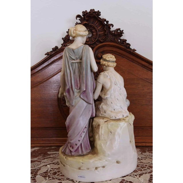 The statuette is marked on the bottom with an "acorn in a triangle with the inscription DUX" - the mark was used on...