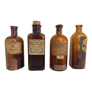 Antique Apothecary Amber Glass Bottle Collection (Set of 4) | Boericke & Tafel, Fritzsche Bros., H. Steine & Co. For Sale