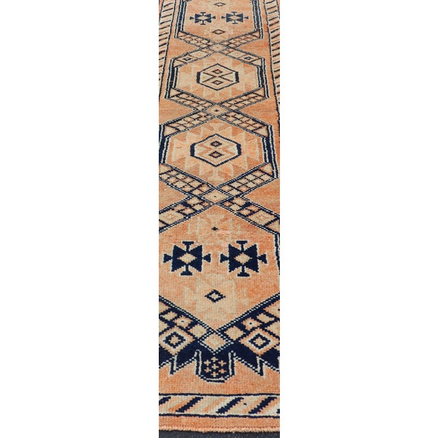Navy Blue Tribal Medallion Design Vintage Turkish Runner in Orange and Navy Blue For Sale - Image 8 of 12