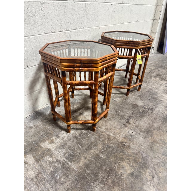 Not sure how old, but in near perfect condition. Octagonal shaped with glass top inserts. Solid. Beautiful burnt bamboo....