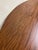This is a vintage Mid Century Modern folding dining table featuring a richly figured rosewood-look laminate top with...