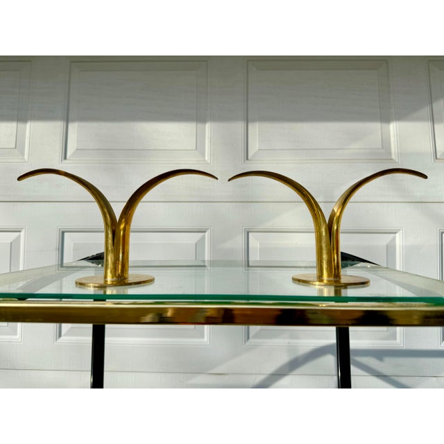 Ystad Metall These Midcentury Ystad Metall Sweden Ivar Ahlenius Bjork Lily Candlesticks are a set of two elegant candle...