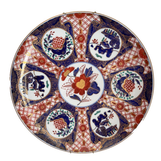 Pair of large scale 16" Diameter gilded Imari plates made in the mid 20th Century. Authentic Gold Imari made in Japan....