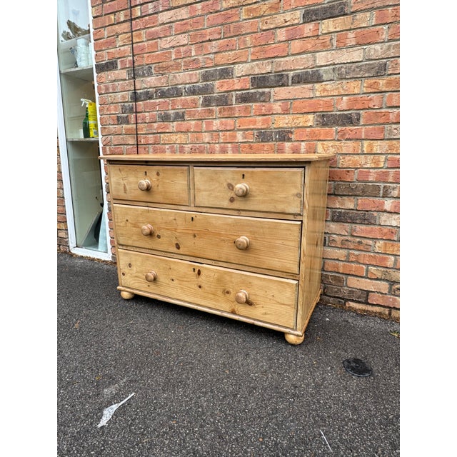 This is a lovely antique pine chest! This piece dates to the 19th century and has lovely patina. The wood has a light...