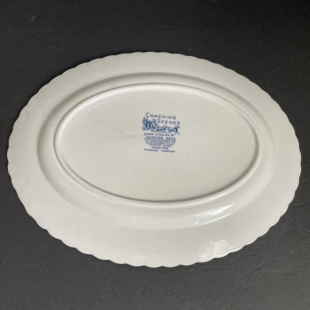 Bring classic English charm to your table with this **Vintage Johnson Brothers Coaching Scenes “Passing Through” Blue &...