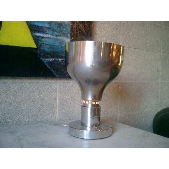 Published. An example of Franco Albini`s table lamps for the AM/AS series, this table lamp boasts a heavy chromed brass...