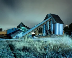 Contemporary Night Photograph "Conveyor and Silos" by John Vias
