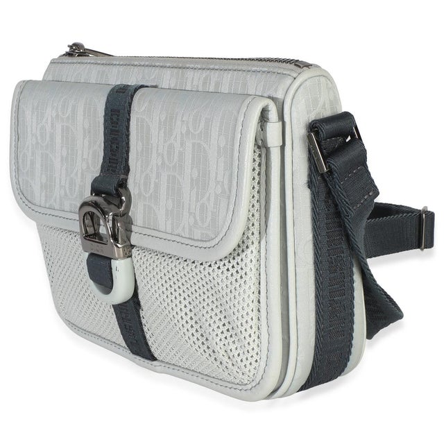 Item #: 153650 Interior Material: Nylon Dimensions: 7.5 x 5.5 x 1.5 in Handbag Closure Type: Buckle Strap Length: 16 in...