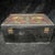 This is a magnificent vintage Chinese lacquer box, elaborately decorated with gilt painted dragons in the imperial style....
