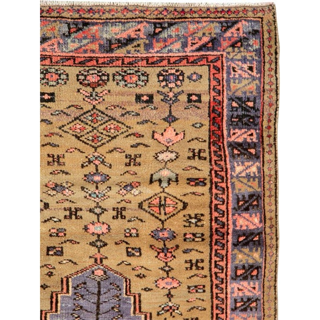 A vintage Persian hamadan rug from the mid-20th century. Hamadan town and the surrounding weaving area of about 120...