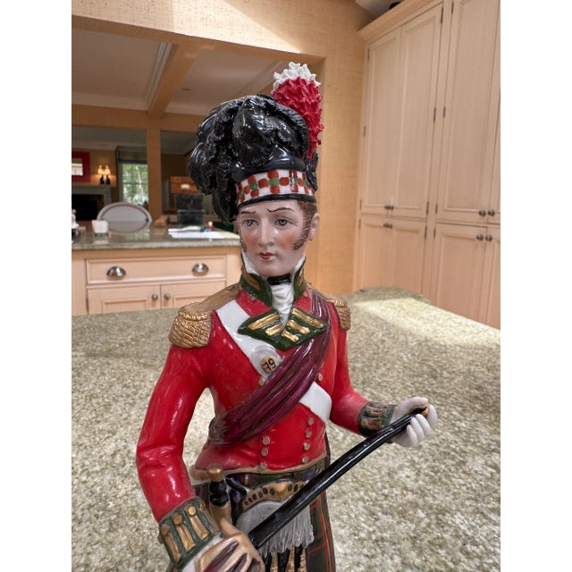 A beautiful Sitzendorf German porcelain figure of a Scottish soldier