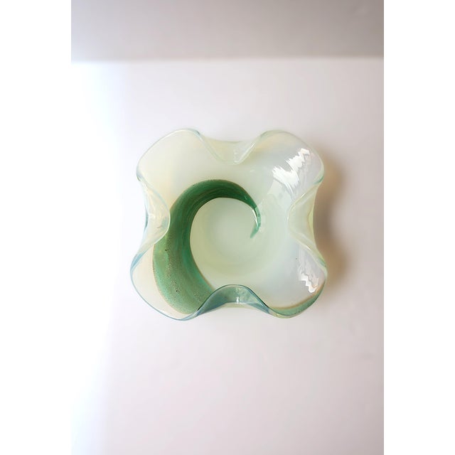 A beautiful Italian Murano art glass bowl, Midcentury Modern Organic Modern design, attributed to Angelo Seguso, circa...