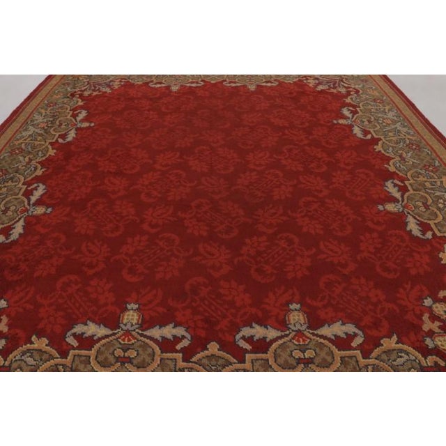 Made with hand-knotted wool and originating from the Netherlands circa 1920-1930, this 12x13 antique Art Deco rug is one...