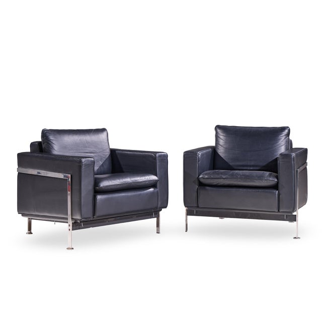 Robert Haussmann for De Sede Mid Century Black Leather Chairs - Pair Each chair measures: 34.25 wide x 32 deep x 32 high,...