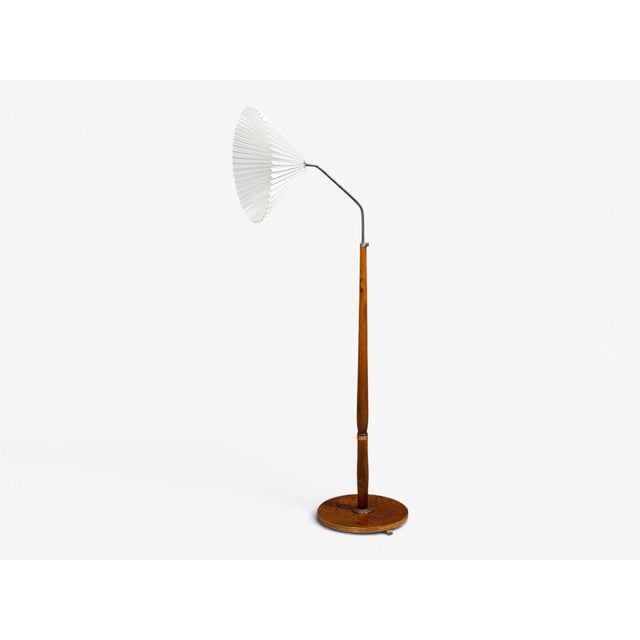 Swedish Art Deco, Floor Lamp, Burl, Brass, Sweden, 1940s A modernist floor lamp designed and produced in Sweden c. 1940s....