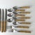 1990s Bamboo Vintage Tableware Bamboo Handle Stainless Flatware Set of 16 Pieces For Sale - Image 5 of 10