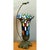 This vintage lamp features a single flared trumpet shade crafted in Tiffany-style stained glass, its ruffled edge composed...
