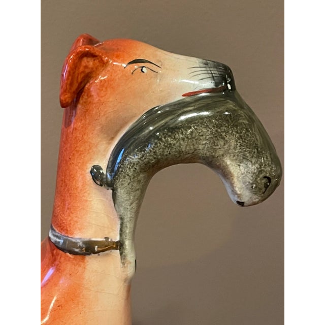 Beautiful 19th Century English Staffordshire Wippets with hunt rabbit. Originally used as decorative objects on fireplace...