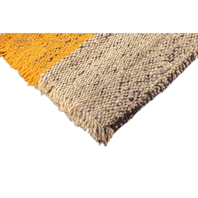 This antique Gabbeh Palas rug, woven circa 1920, is a rare piece of Persian tribal art. It features a flat-woven wool base...