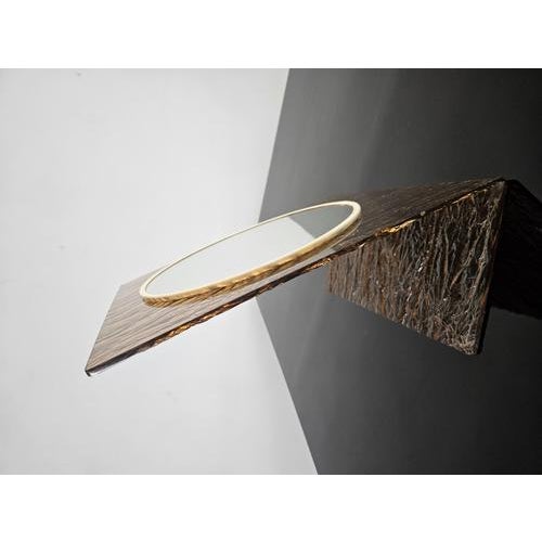 Italian table mirror in sculptural acrylic glass, produced in Italy during the 1960s. The acrylic has a distinctive...