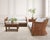 A beautifully crafted pair of woven rattan wicker sofas designed in the manner and style of Michael Taylor by The Wicker...