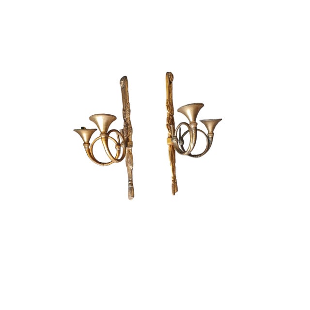 Vintage pair of heavy gilt bronze wall sconce candleabras. Candleabras have a tied tassel motif and are labeled Japan on...