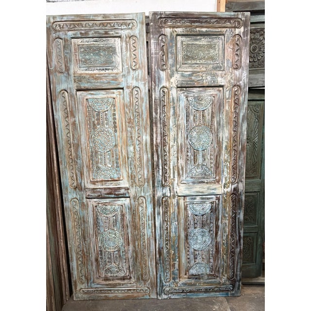 Bring poetic charm and vintage elegance into your home with this antique carved wooden door, finished in a beautifully...
